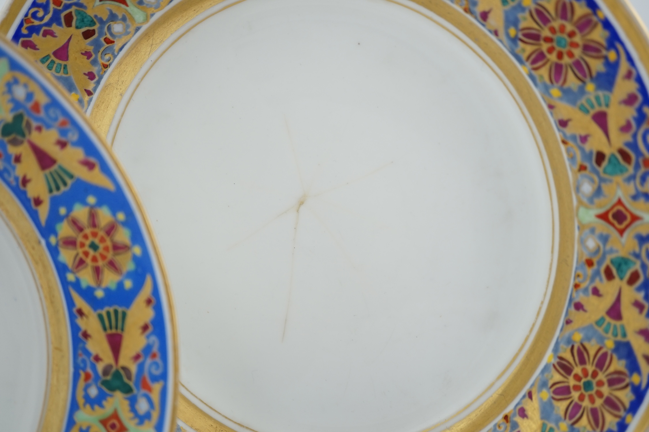 A pair of Nicholas II Imperial porcelain factory plates, from the Gothic service, green printed marks, 23.5cm diameter. Condition - poor to fair repairs